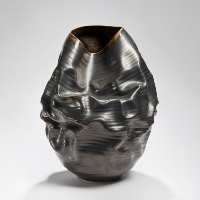 black crumpled ceramic stoneware vase art