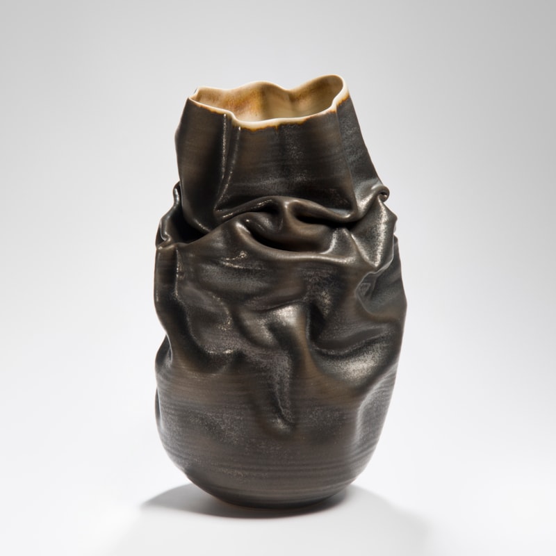 crumpled black stoneware clay vase art