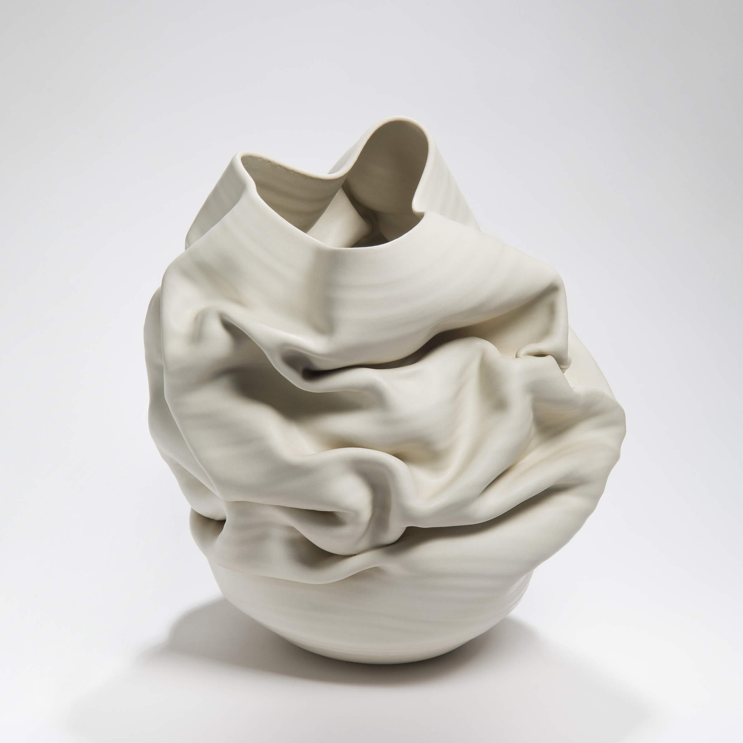 crumpled white clay stoneware vase sculpture