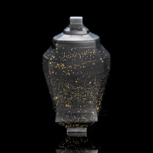 oriental style decorative glass art urn vase in black and gold