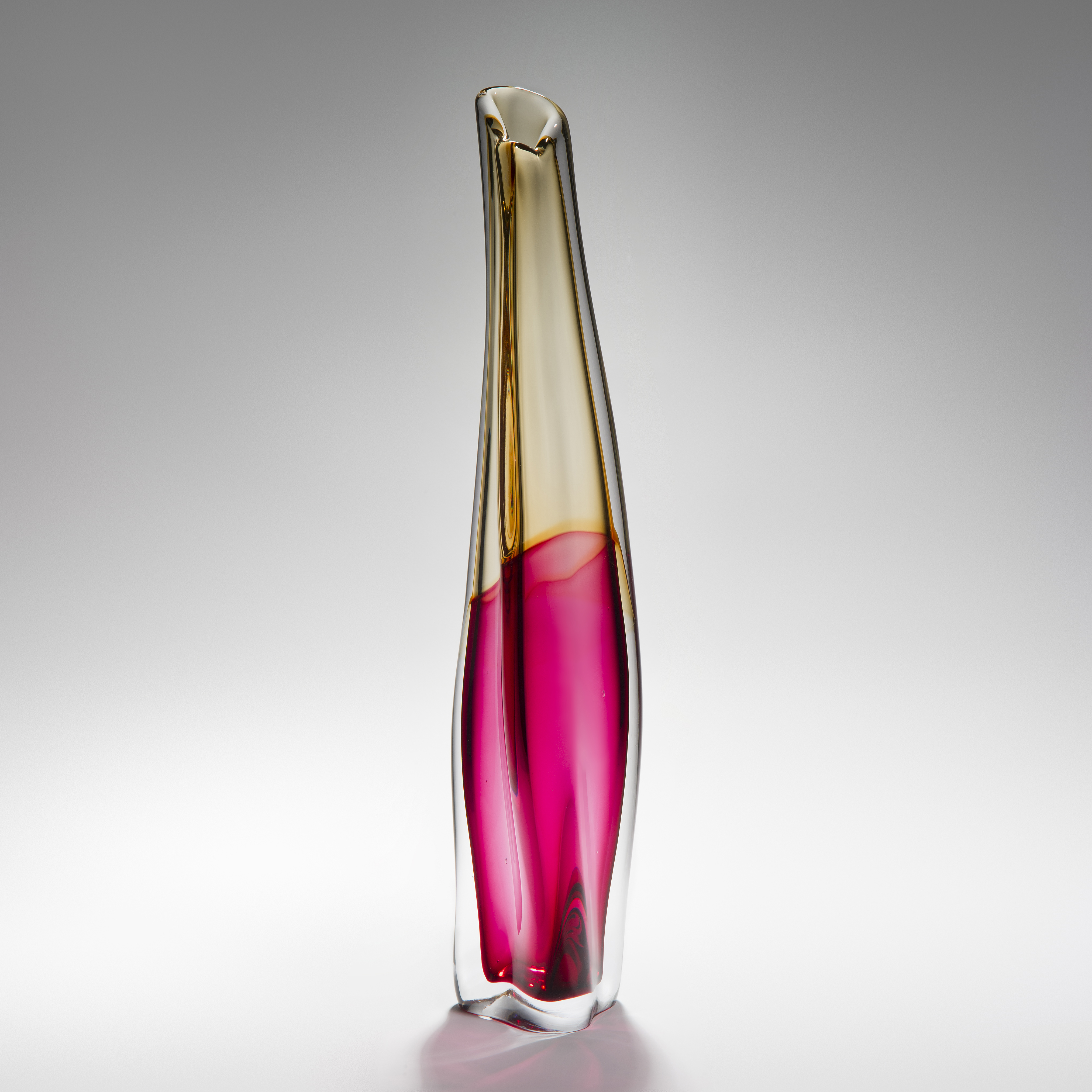 handblown sculpted tall thin glass ornament in clear pink and gold