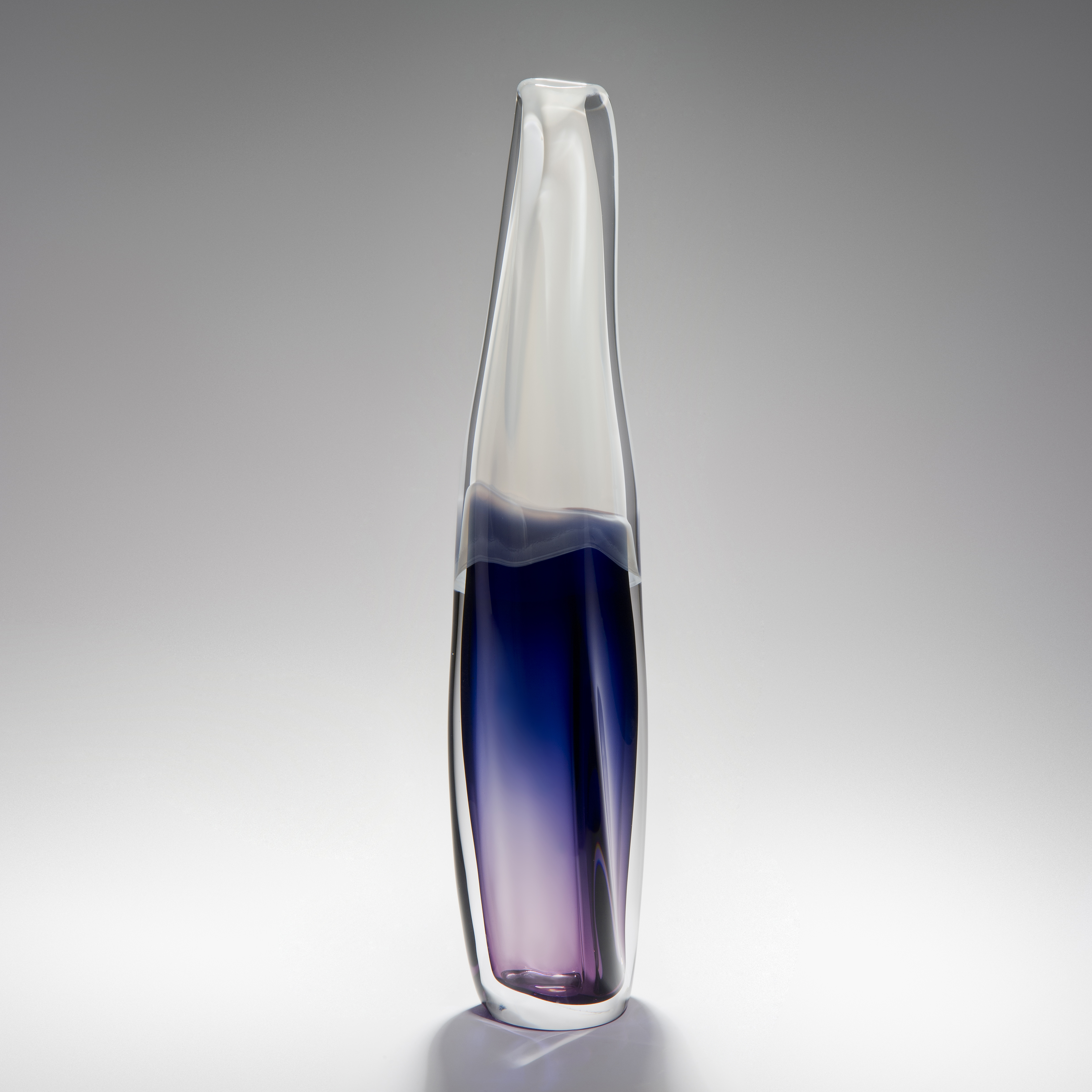 handblown sculpted tall thin glass ornament in clear blue and pink