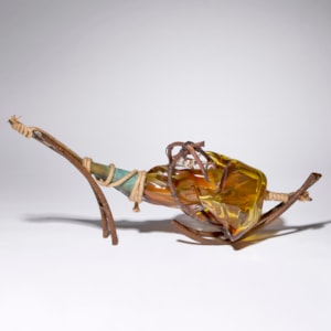 amber and brown contemporary mixed media abstract sculpture made blown glass patinated metal and rope