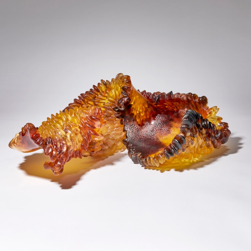 amber red and brown contemporary textured art-glass sculpture made from cast glass