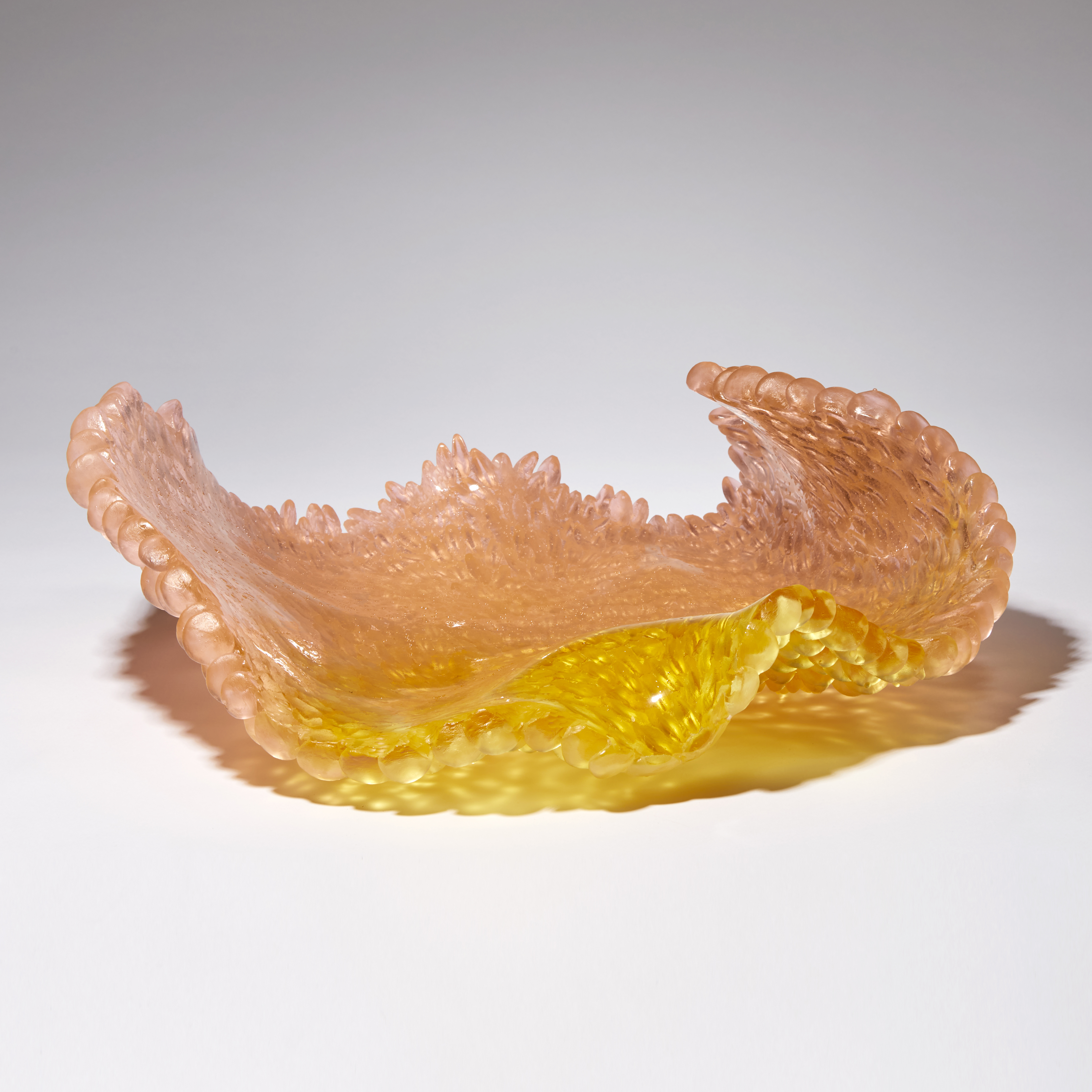 pink yellow and amber contemporary textured art-glass sculpture made from cast glass