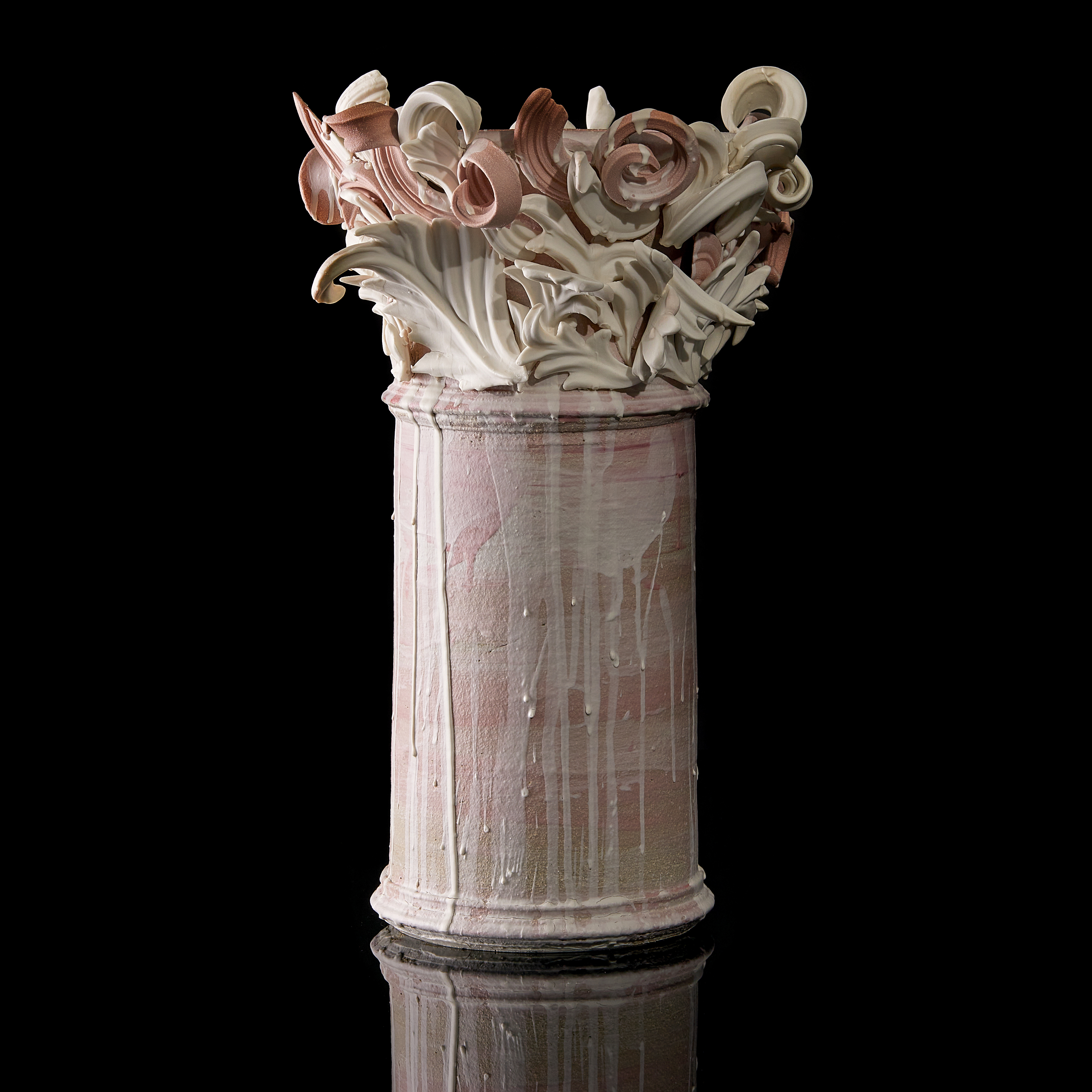 white and pink contemporary architectural weathered ceramic sculpture made from hand sculpted clay