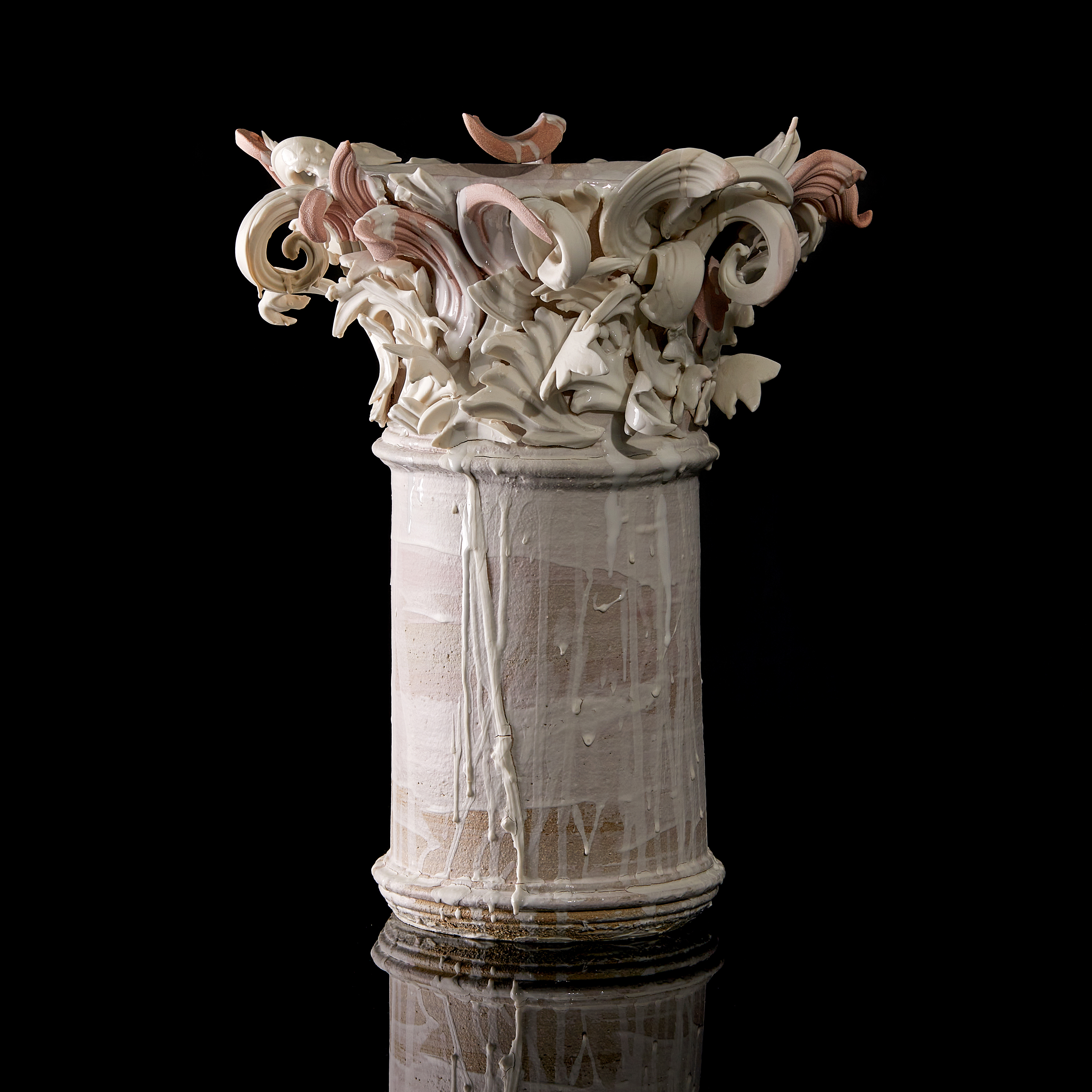 white and pink contemporary architectural weathered ceramic sculpture made from hand sculpted clay