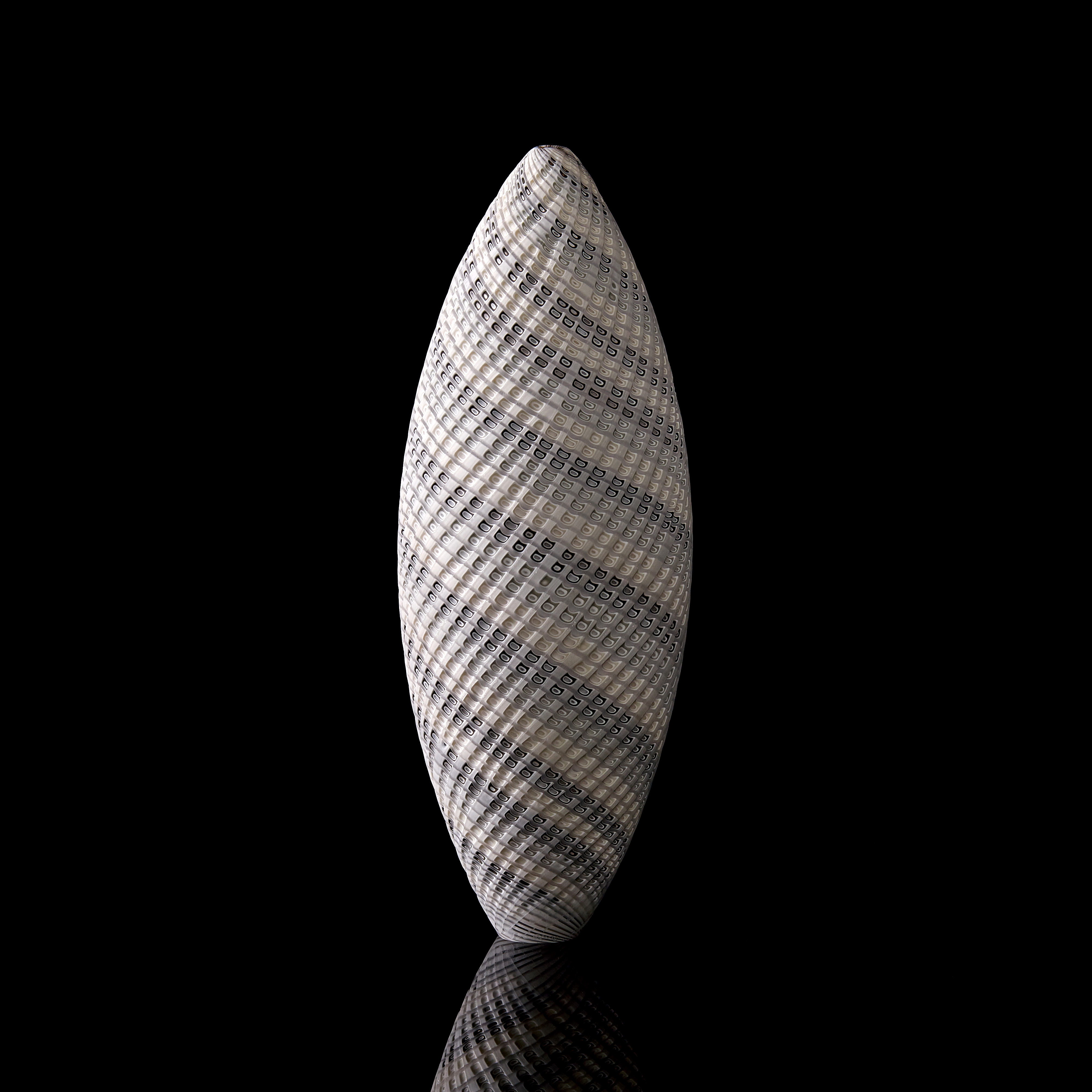 grey and white contemporary sculptural vessel with swirling pattern made from handblown and cut glass