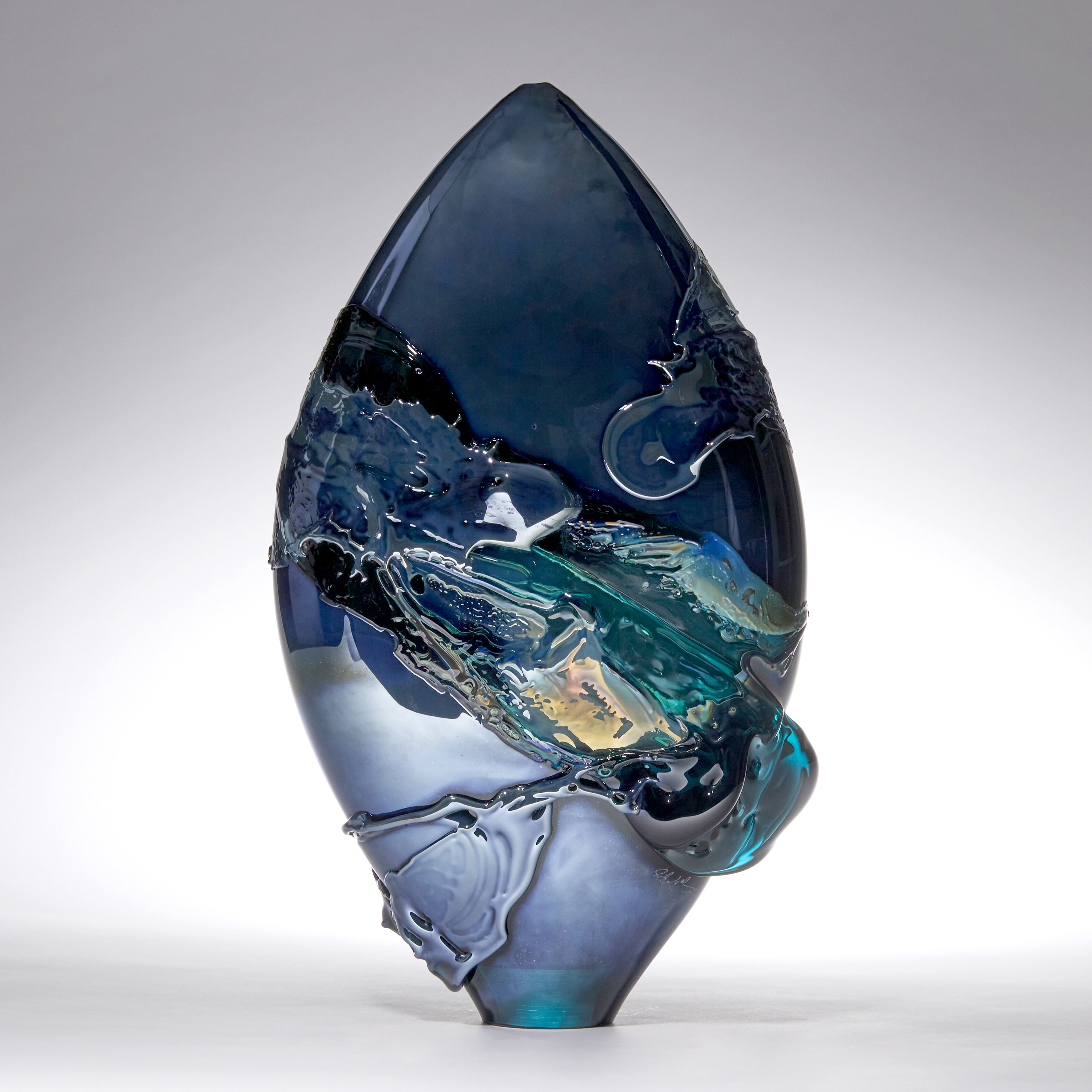 metallic blue and teal green pointed oval handmade glass vase with organic painted looking decoration 