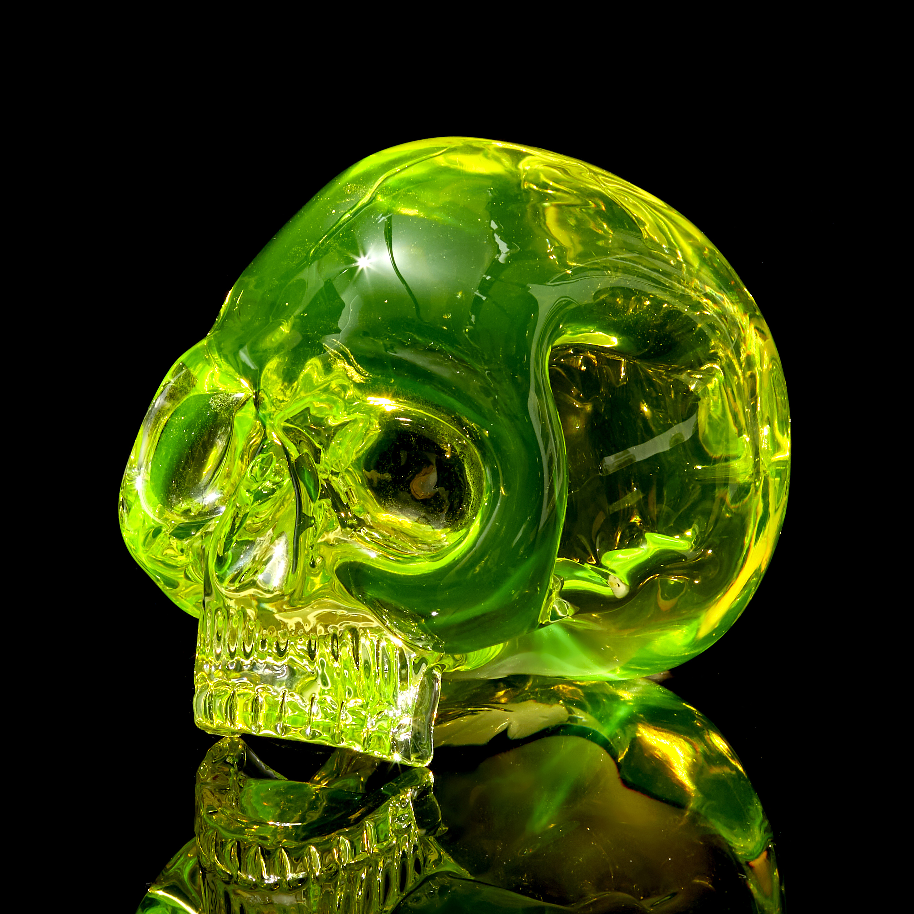 uranium coloured hand sculpted solid glass human skull 