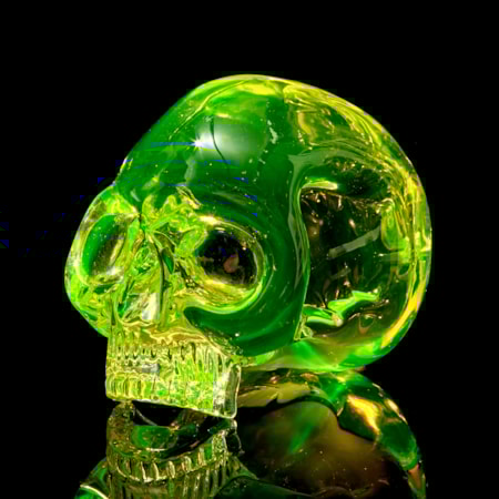 uranium coloured hand sculpted solid glass human skull
