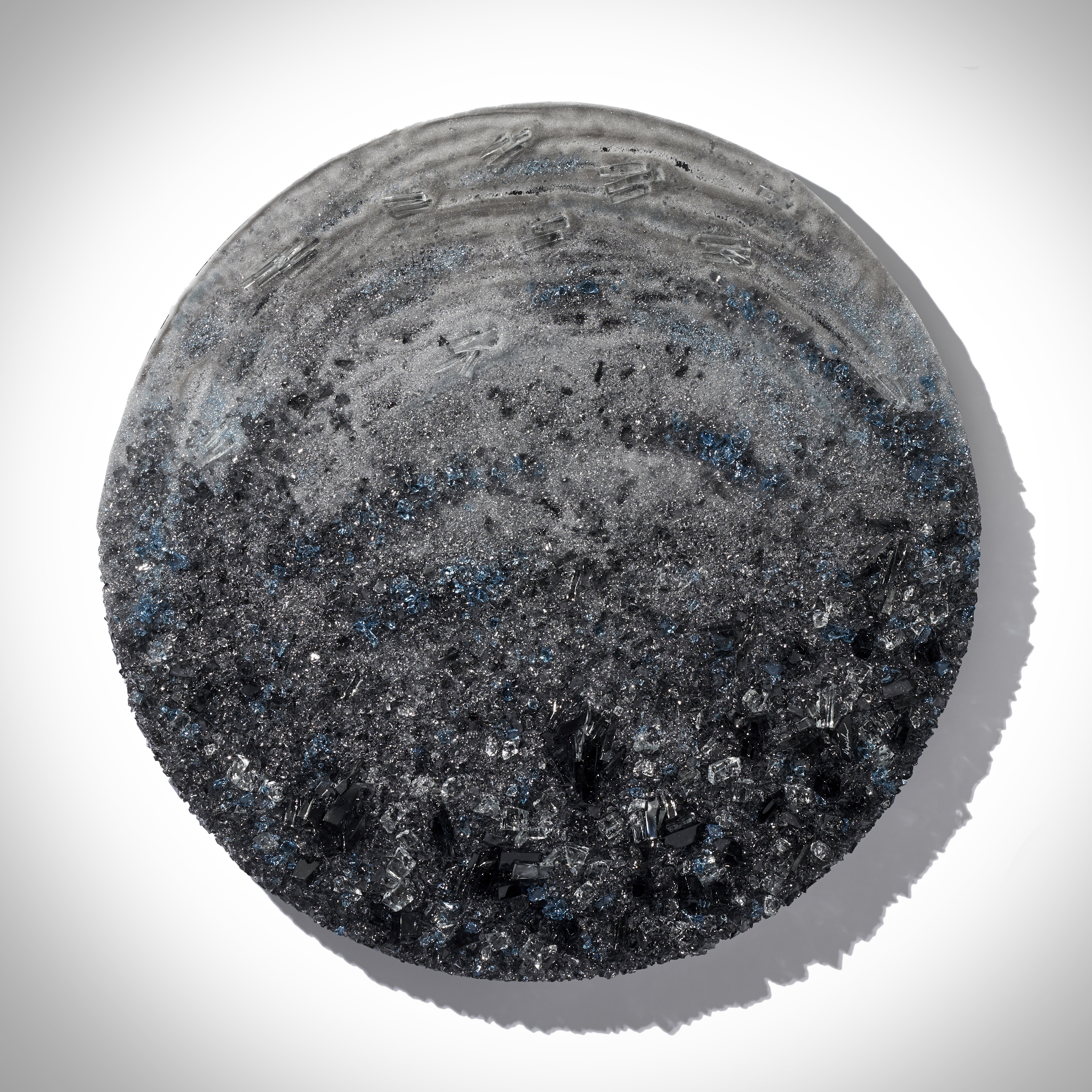grey and blue crystal adorned wall mounted organically textured artwork on a lacquered backboard