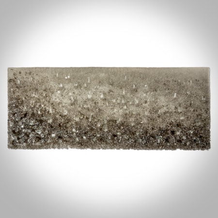 bronze and clear crystal adorned wall mounted organically textured artwork on a lacquered backboard