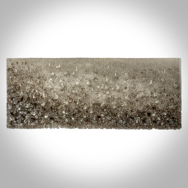 bronze and clear crystal adorned wall mounted organically textured artwork on a lacquered backboard