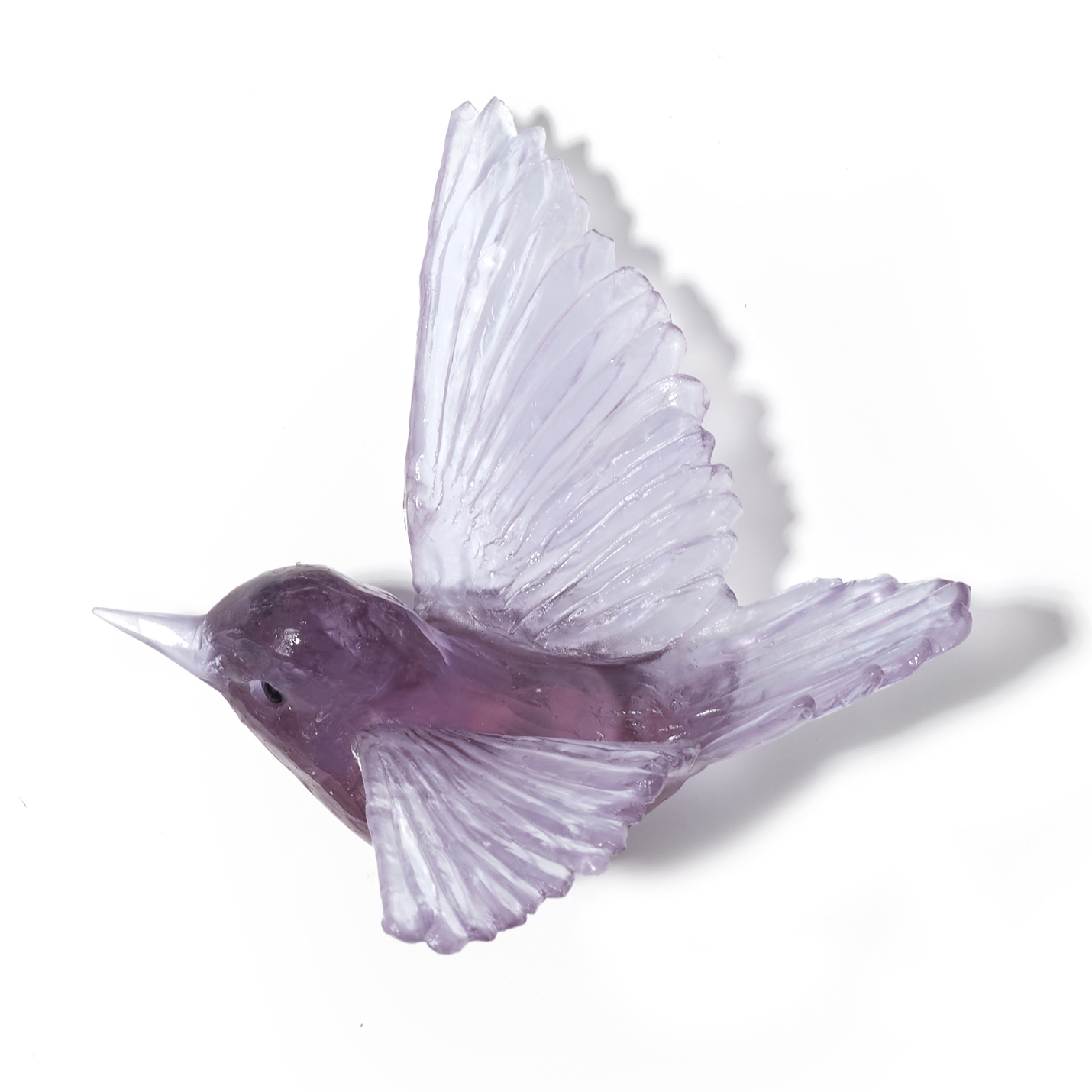 sculpted glass models of birds in various pastel colours