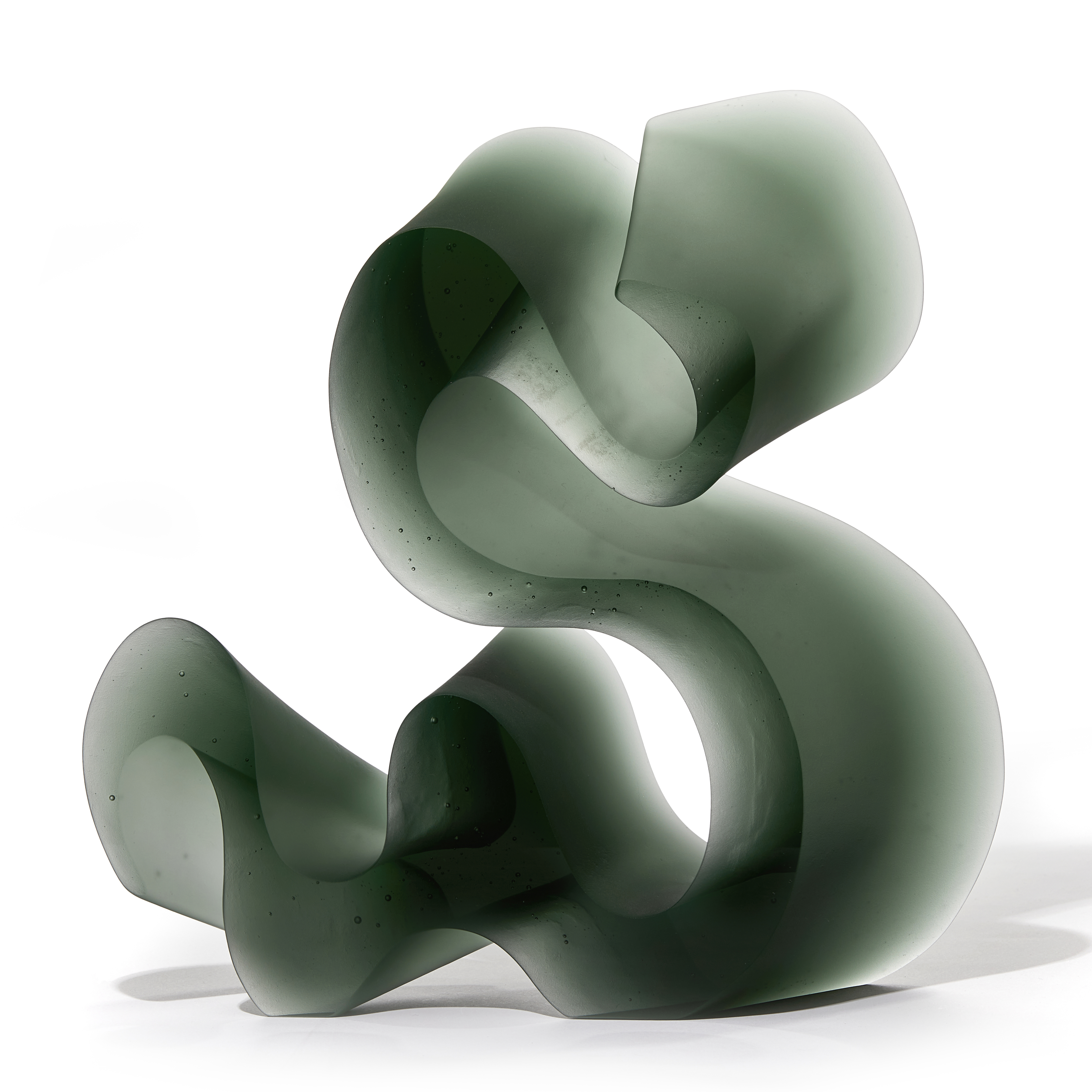 green abstract line sculpture made from cast glass