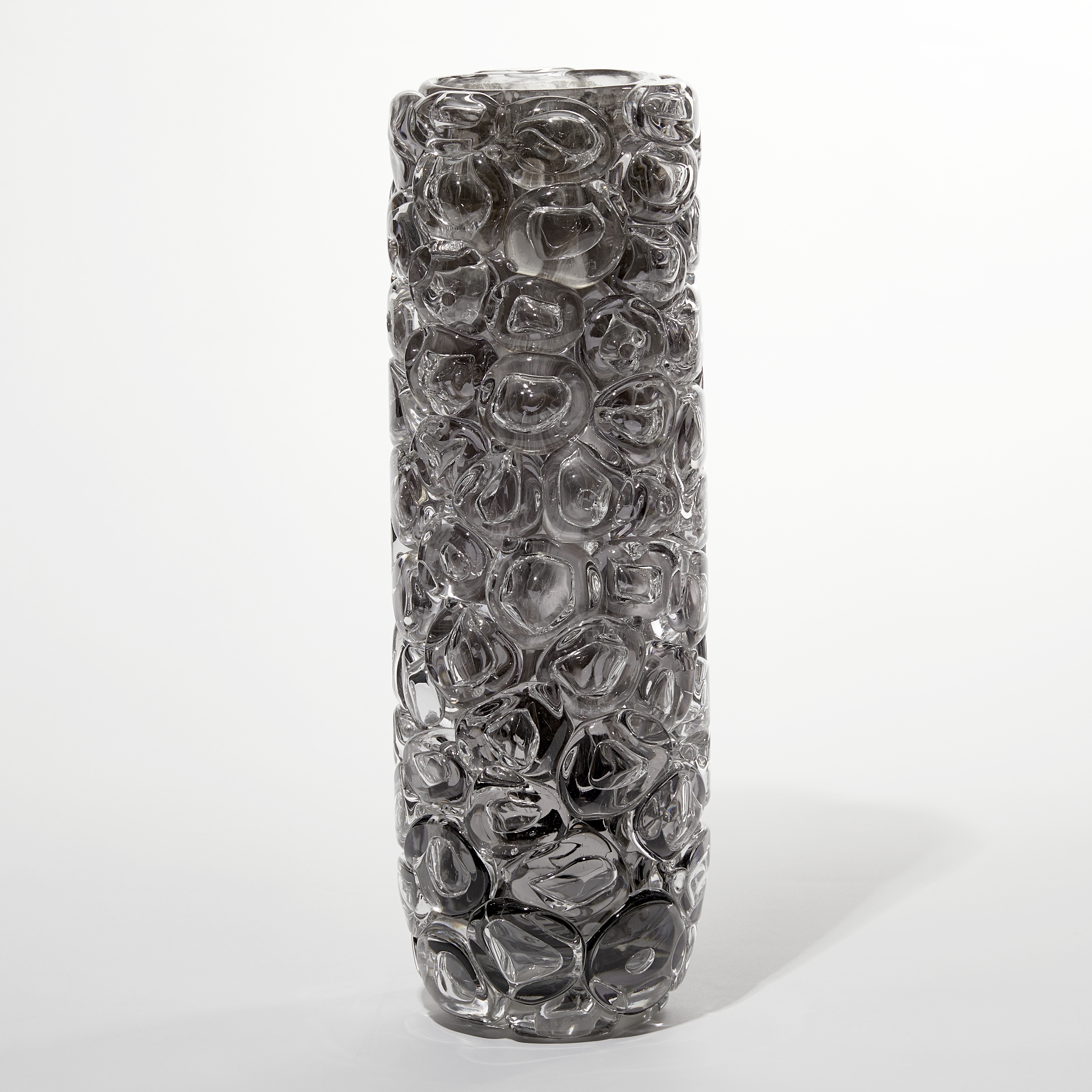 grey and clear cylindrical sculptural glass vase covered in large clear bubbles made from handblown glass with mirrored interior