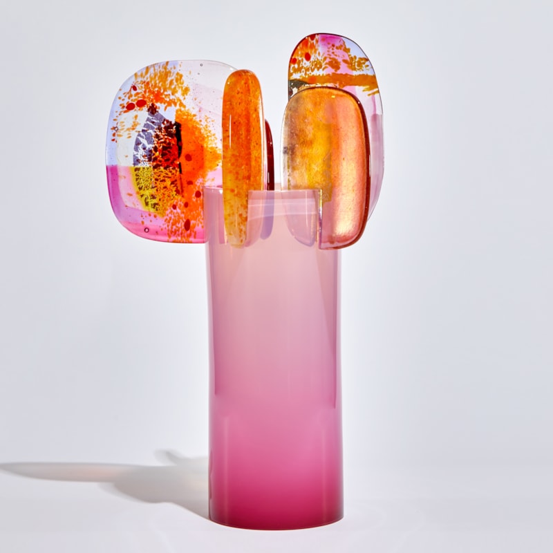 bright pink and orange abstract lollipop style sculpture handmade from glass