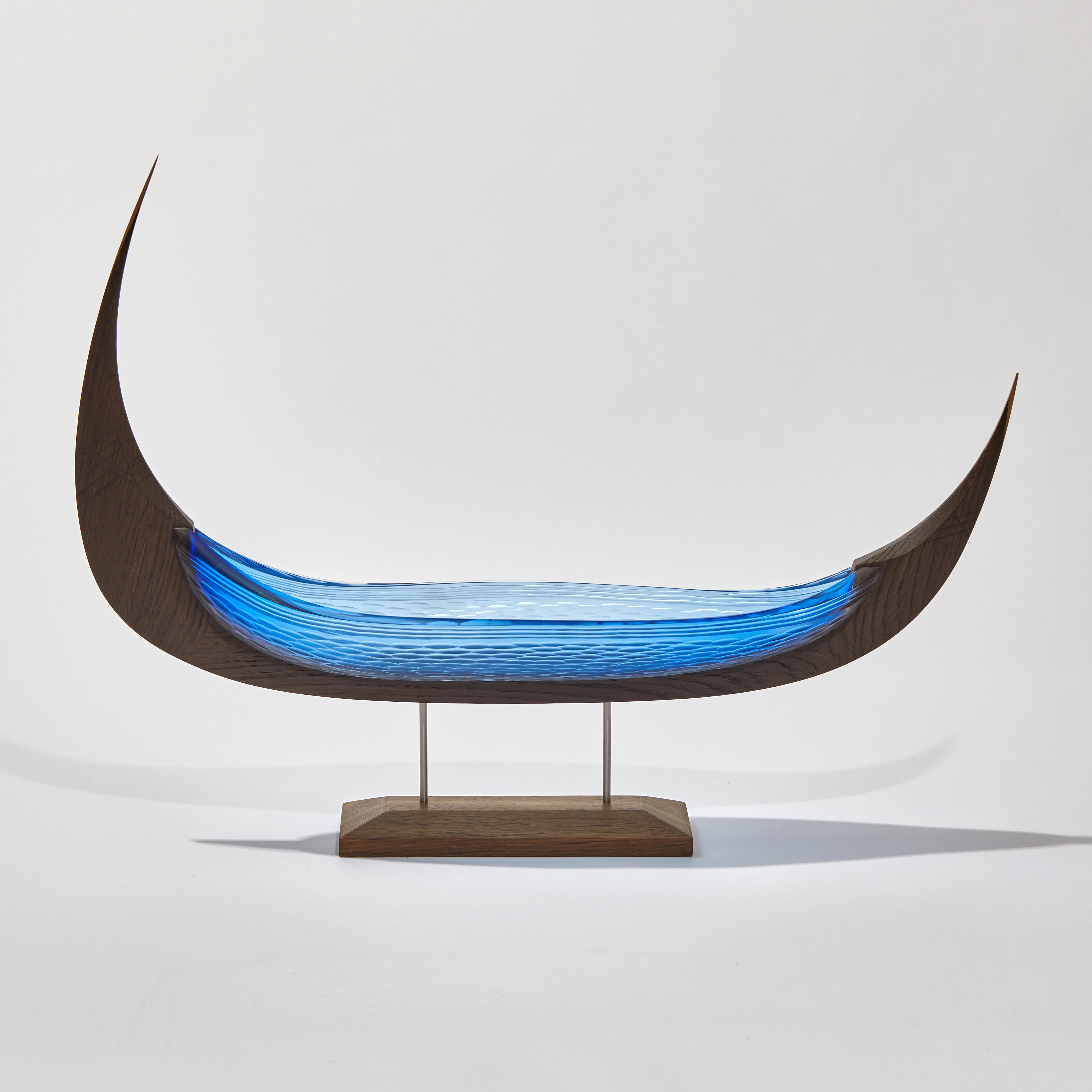 aqua blue viking ship with textured hull handmade from glass and oak