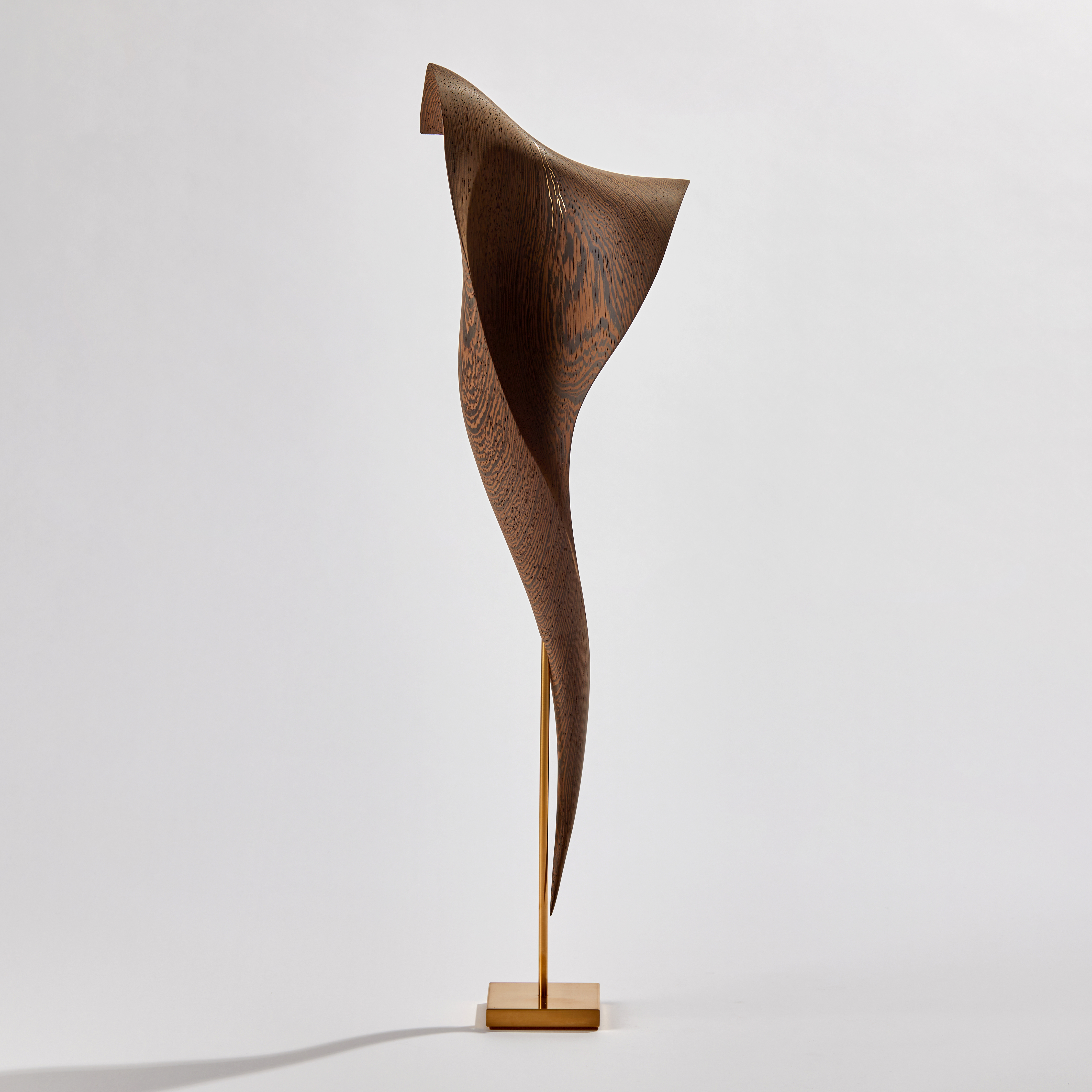 stylised cobra snake wooden handmade sculpture with gold detail and base