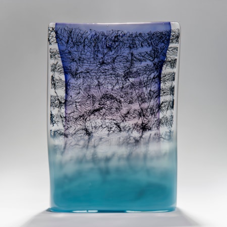 Rectangular standing glass sculpture in purple blue and clear glass with encased scribbled black lines