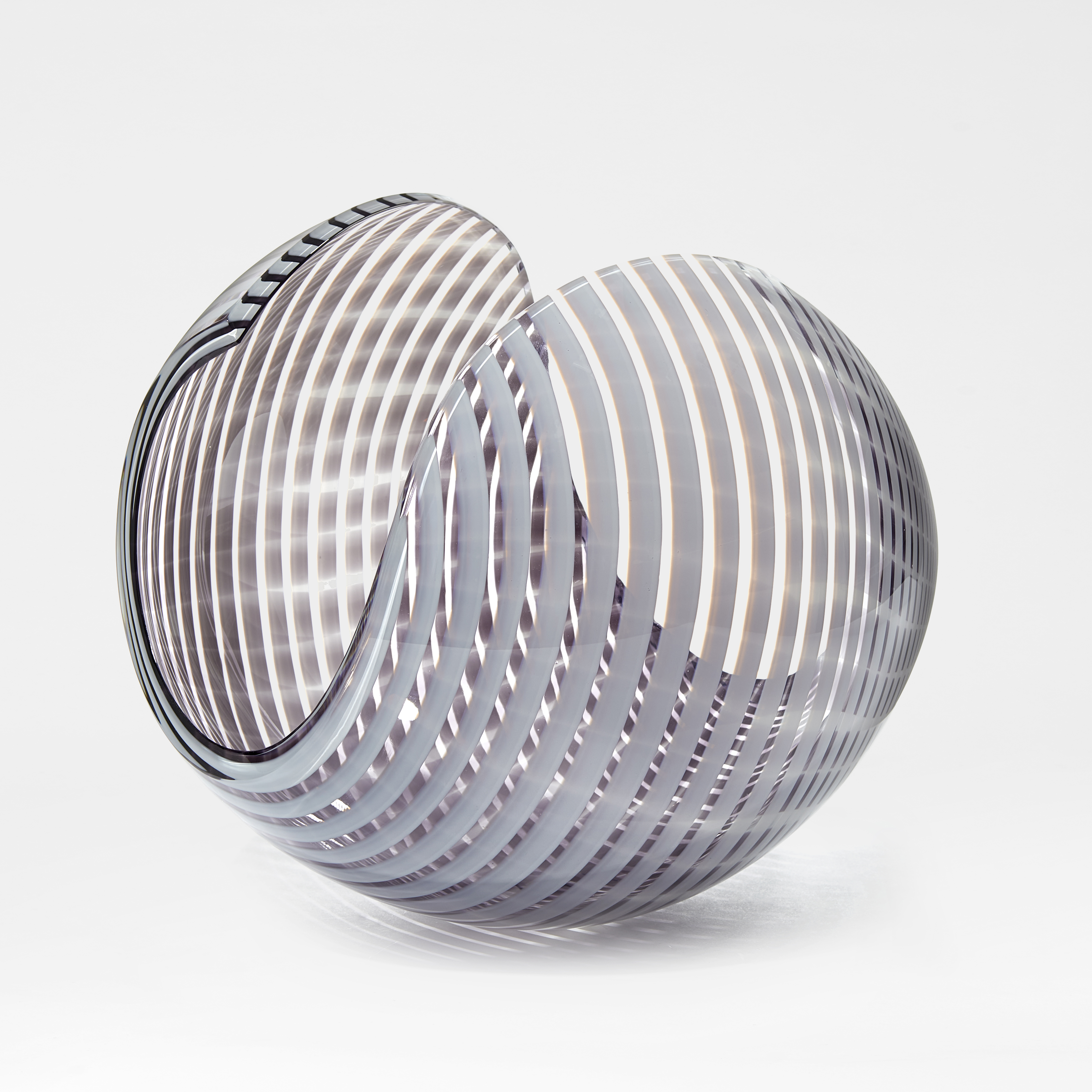 white and aubergine striped shiny contemporary rounded art-glass sculpture made from blown and cut glass