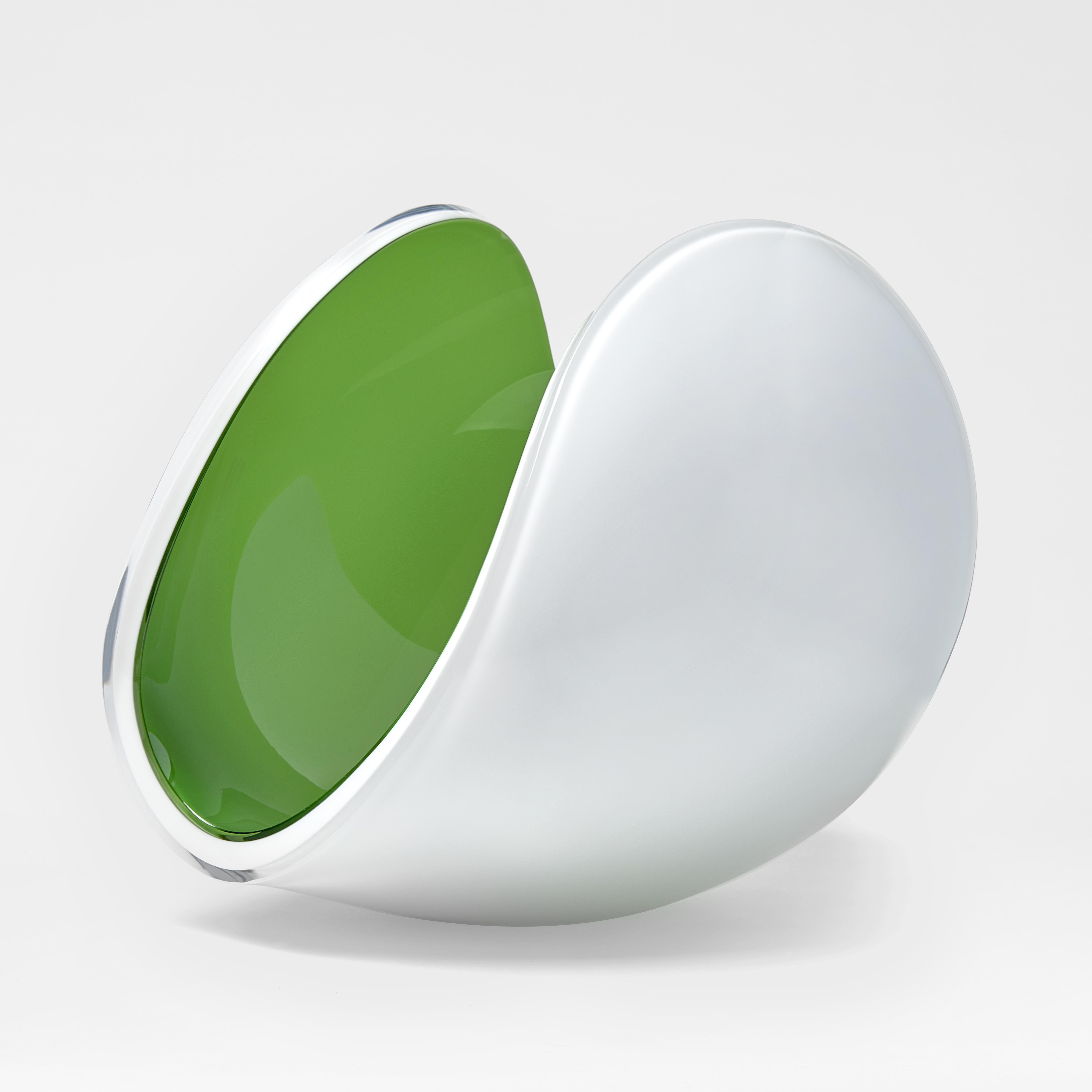 white and apple green glossy contemporary rounded art-glass sculpture made from blown and cut glass