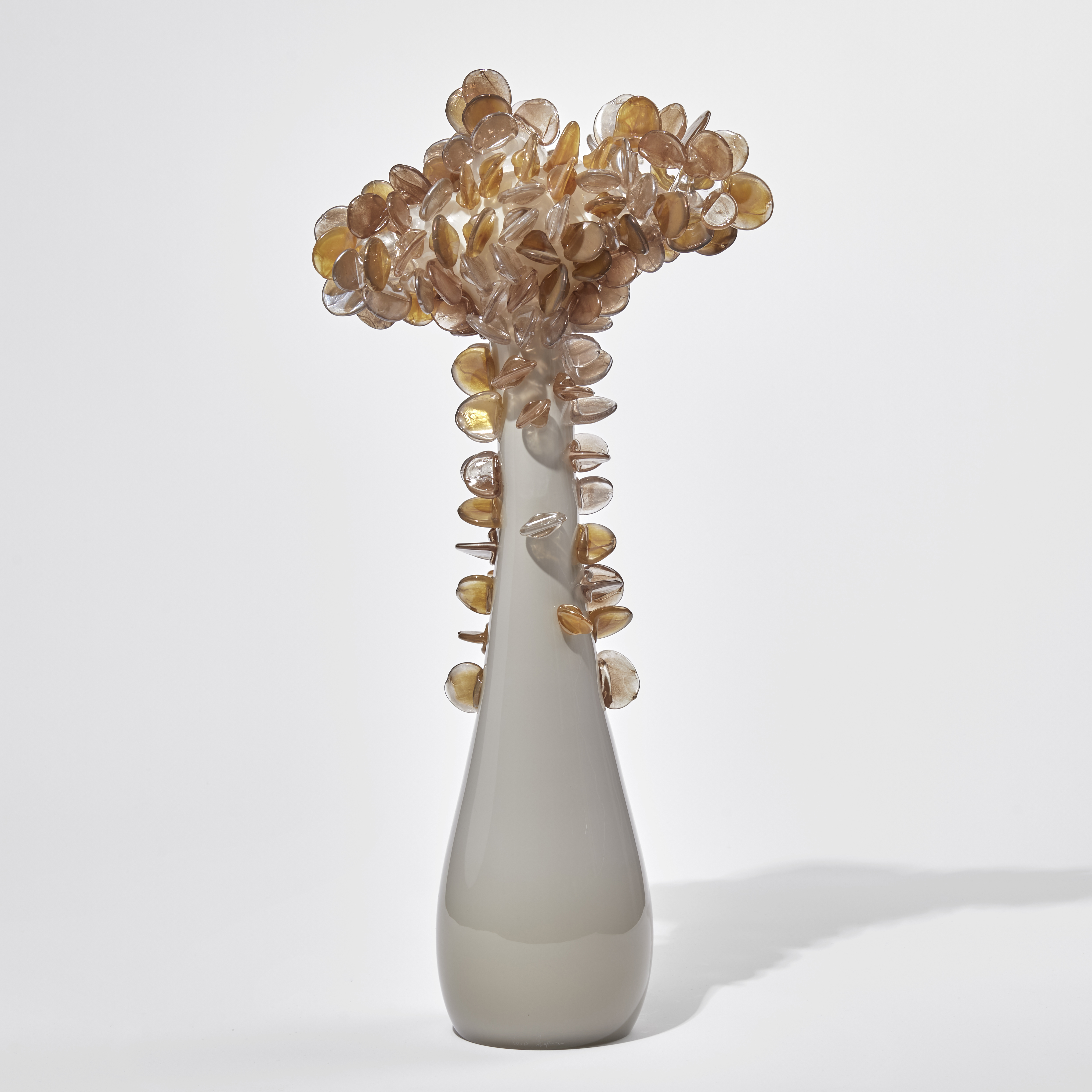 blown art glass flower ornaments in orange and pink 