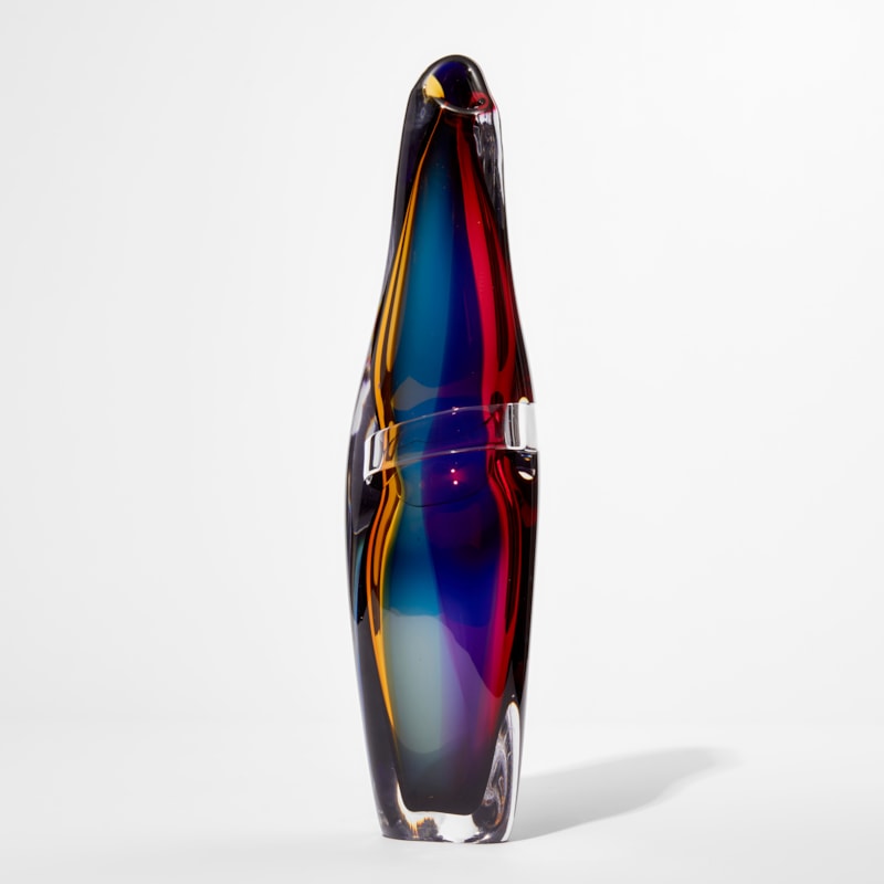 tall handblown glass-art ornament in luminous red blue yellow and green