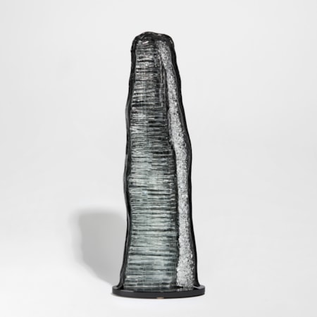 Tall geode inspired grey black and clear glass handmade sculpture with texture crystal detailed interior