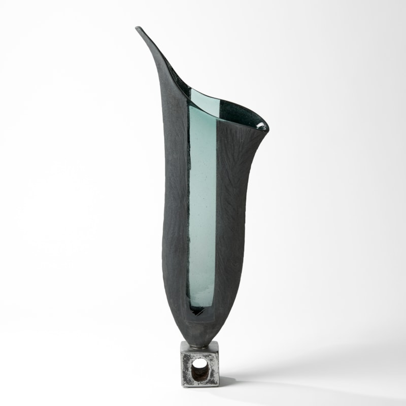 slate grey and blue tall offset fluted vessel with steel base handmade from glass