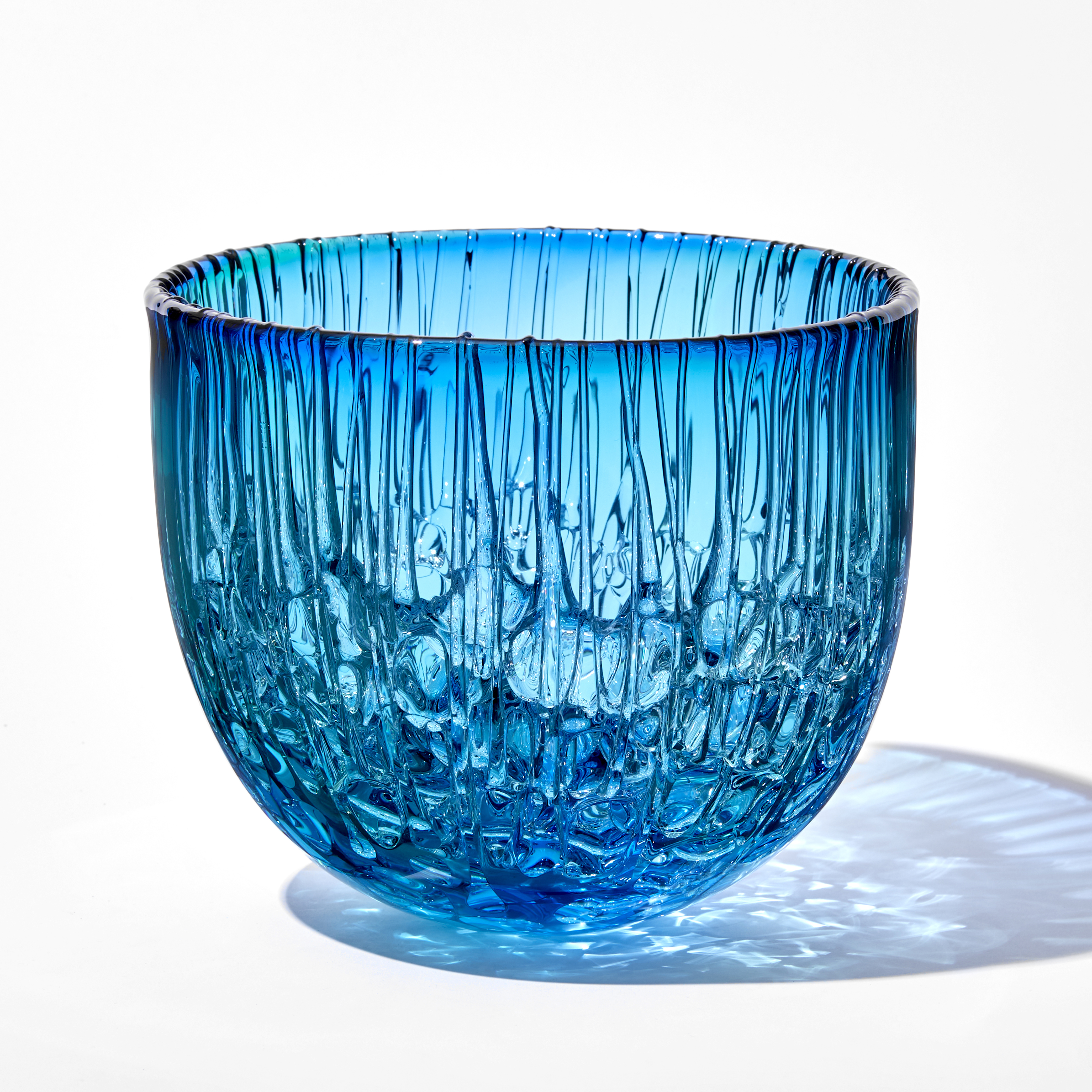 blue and green rounded based bowl with dribbled inside hand made from glass