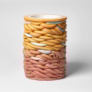 graduating from salmon pink to yellow with blue sections towering woven handmade ceramic vessel