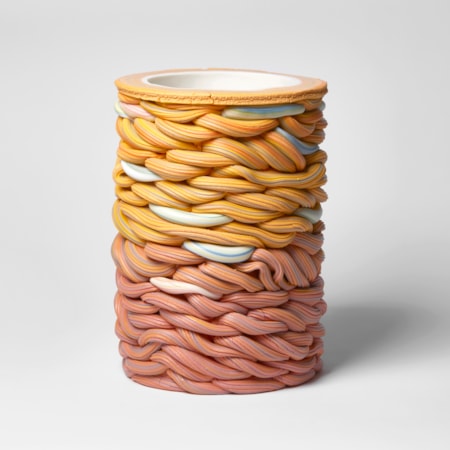 graduating from salmon pink to yellow with blue sections towering woven handmade ceramic vessel