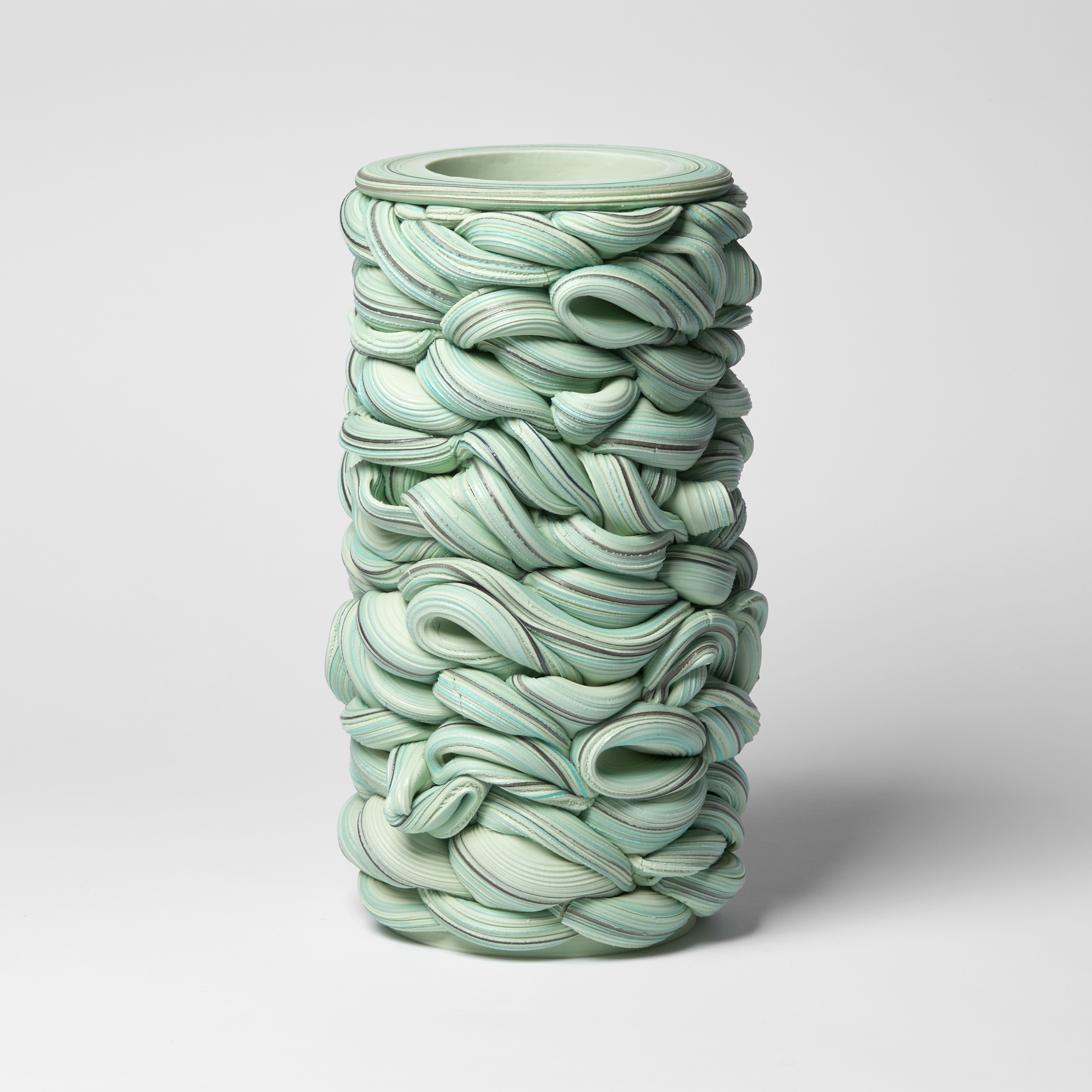writhing green abstract snakes interwoven vessel handmade from parian porcelain