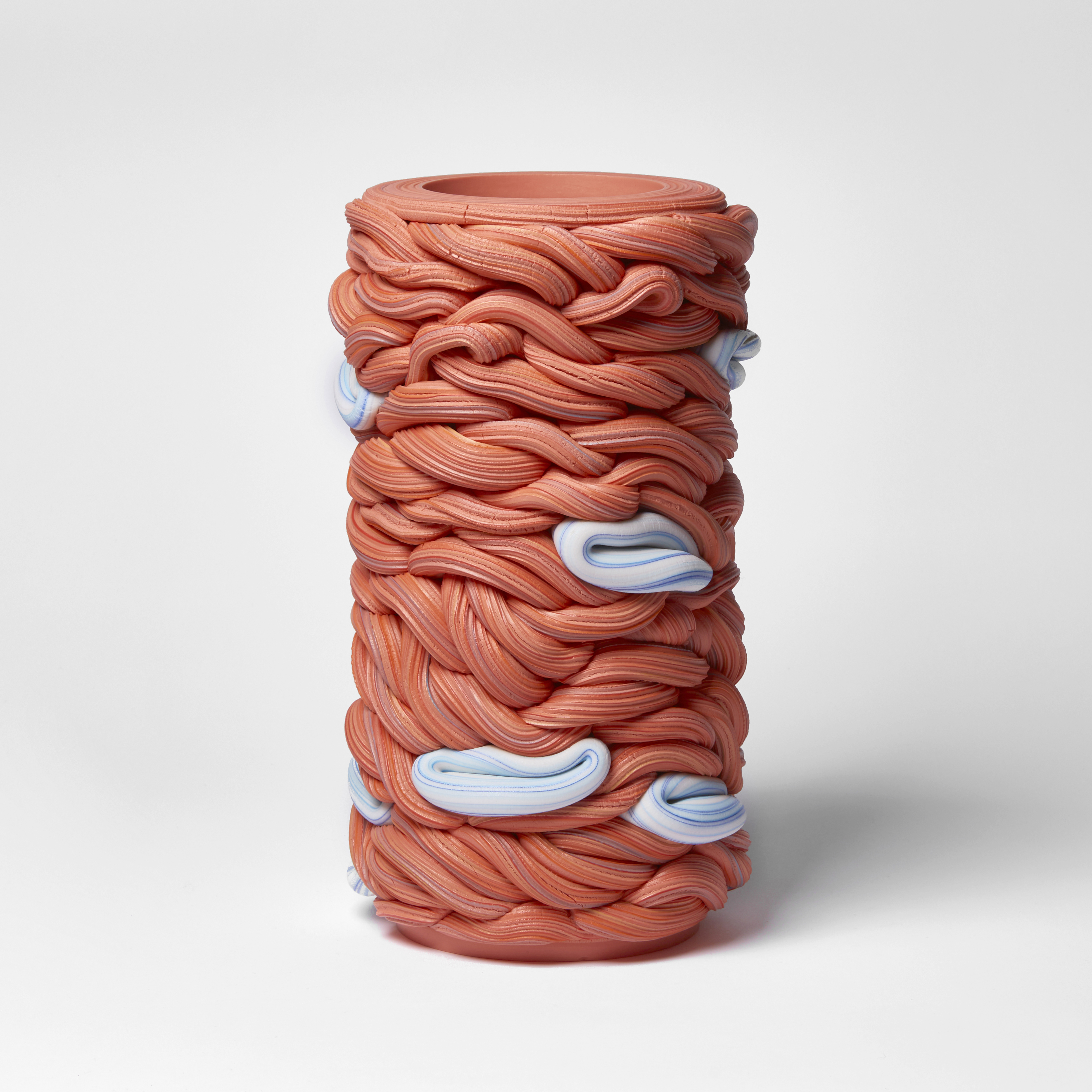 chunky red woven stacked vessel with blue sections handmade from clay