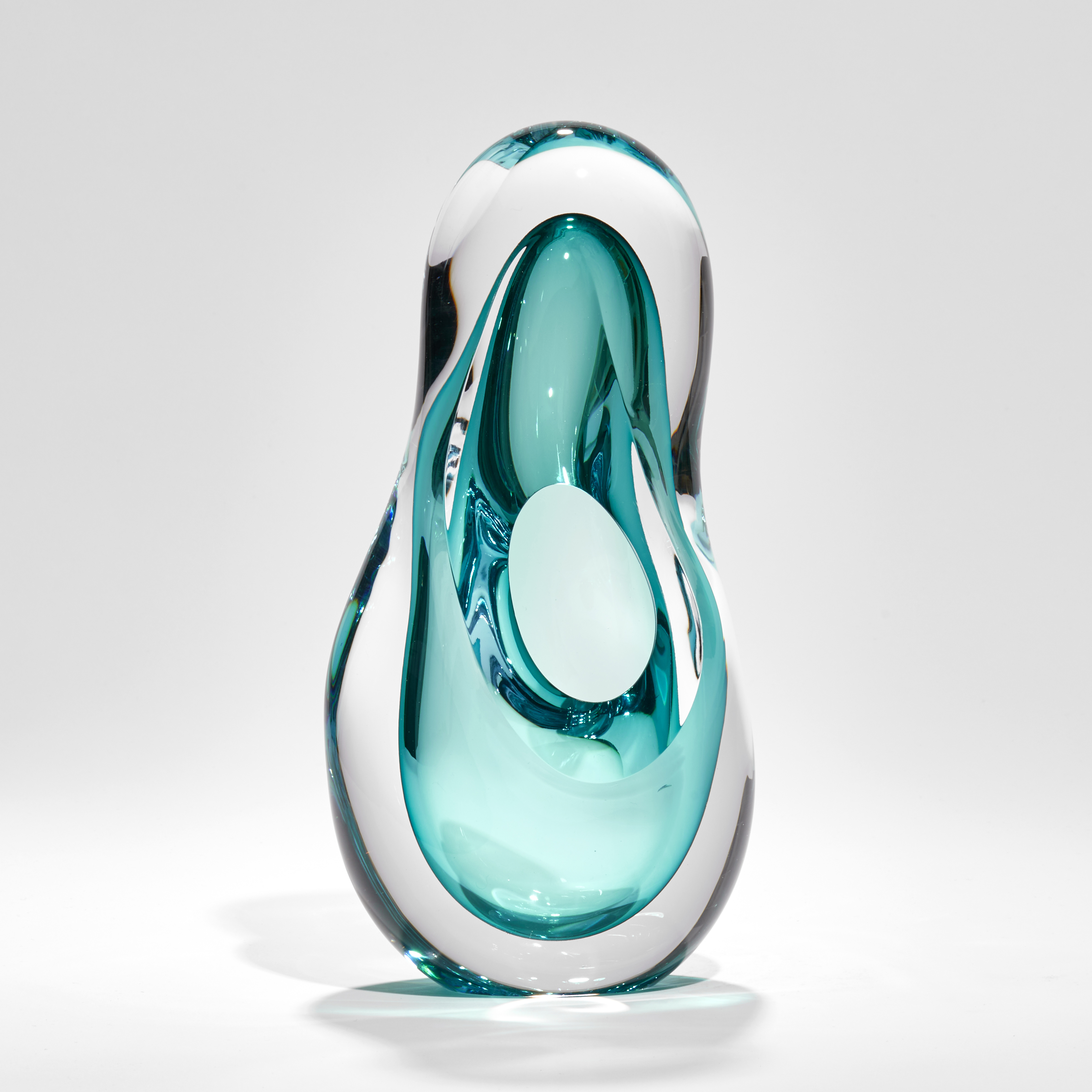 rounded teardrop form with front opening hand made from glass in clear and watery green turquoise
