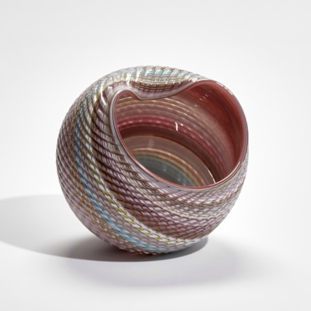 abstract striped pastel coloured shell sculpture with glossy interior and ridged cut exterior handmade from glass