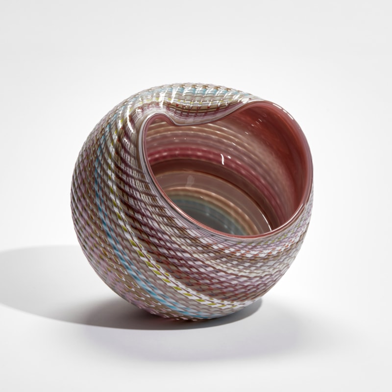 abstract striped pastel coloured shell sculpture with glossy interior and ridged cut exterior handmade from glass