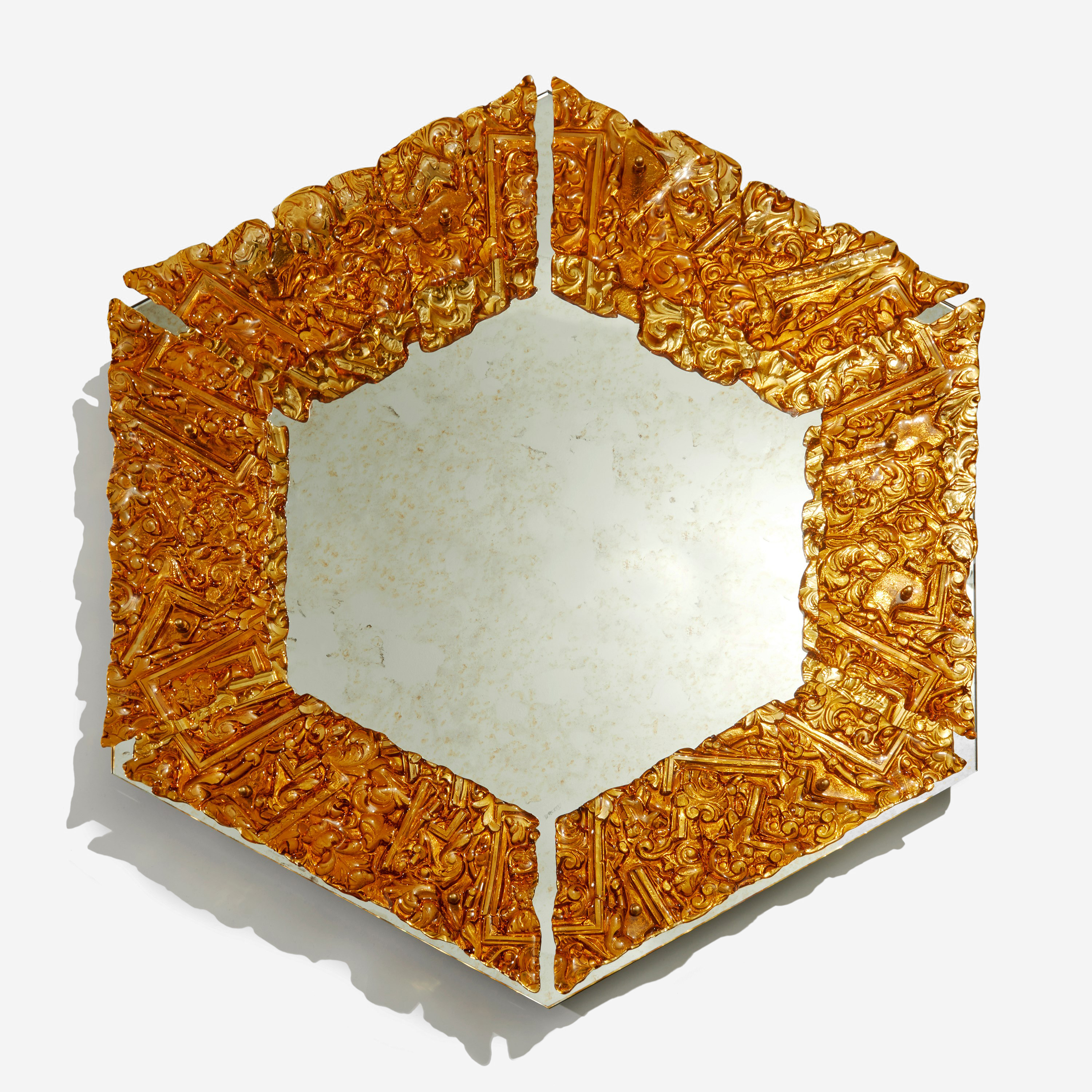 hexagonal decorative mirror with crusted amber glass border