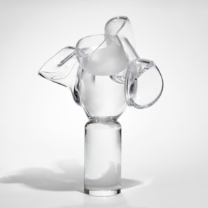 abstract soft tree and human heart inspired sculpture with column trunk and squished bubbles on top hand made from glass
