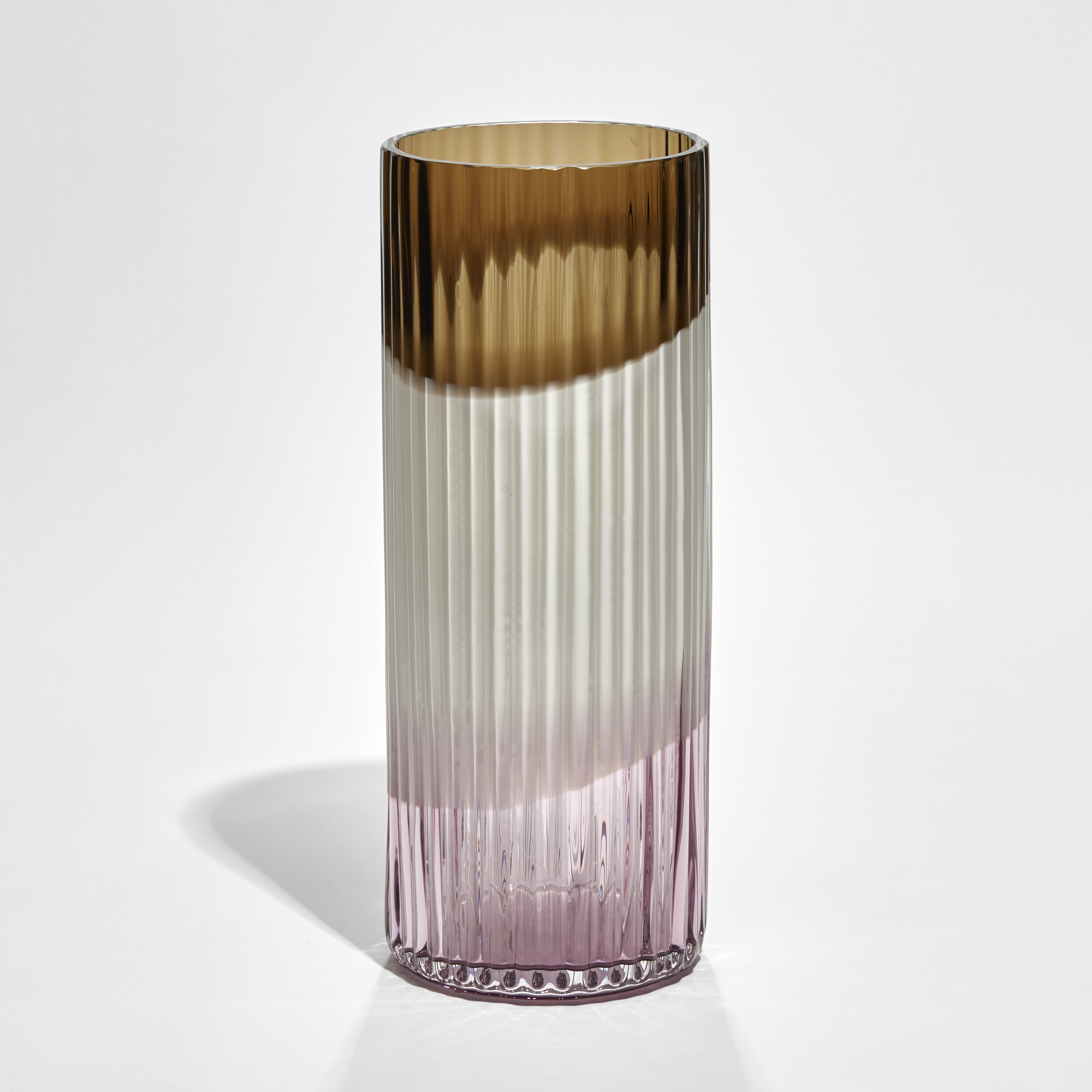 brown opaque white and pink round cylinder vase with external organic ridges hand made from glass 