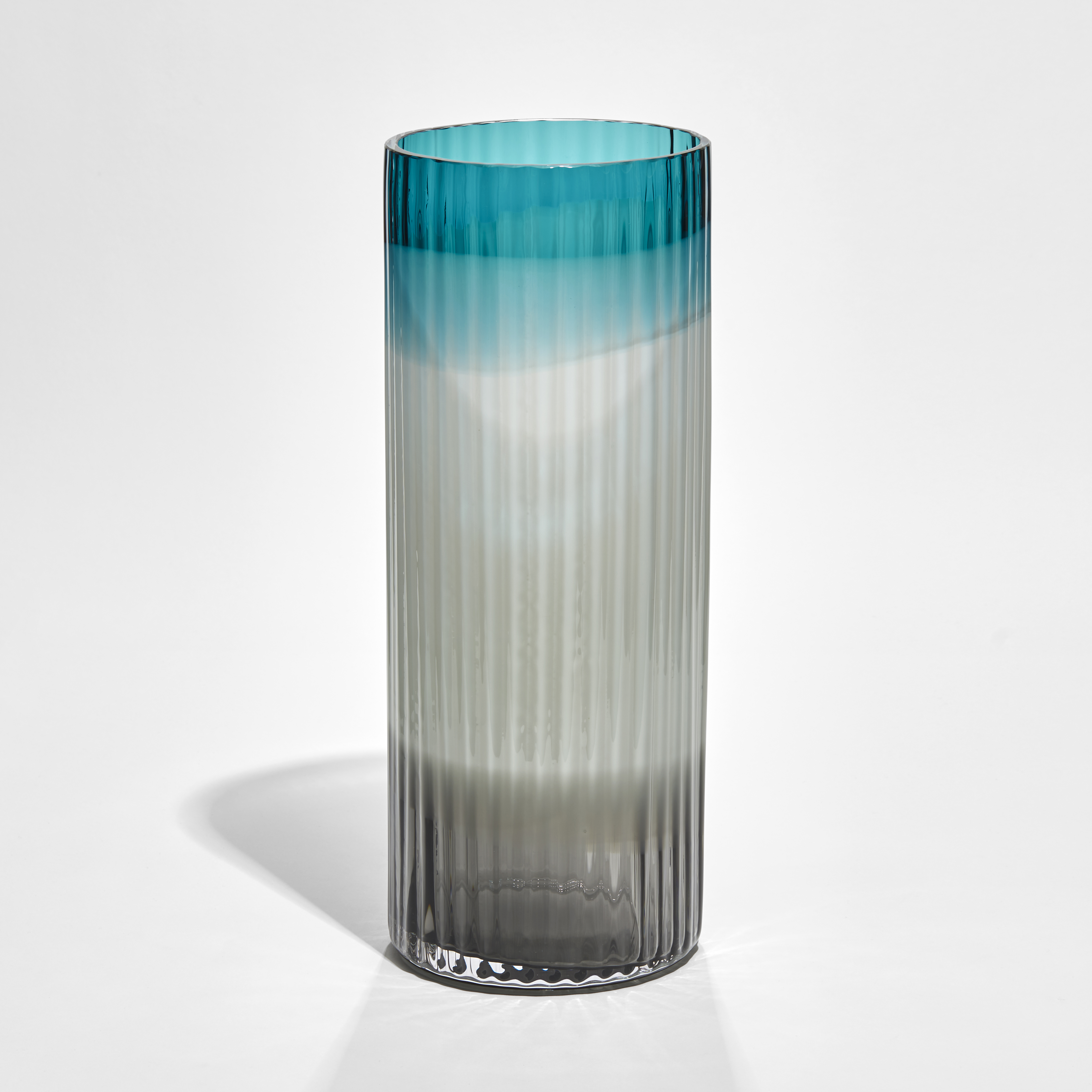 ridged cylinder vase in three bands of turquoise light blue and black hand made from glass
