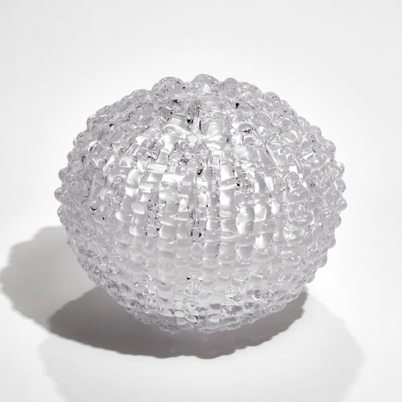 handblown spherical contemporary art glass sculpture in opaline arranged from small individual shards