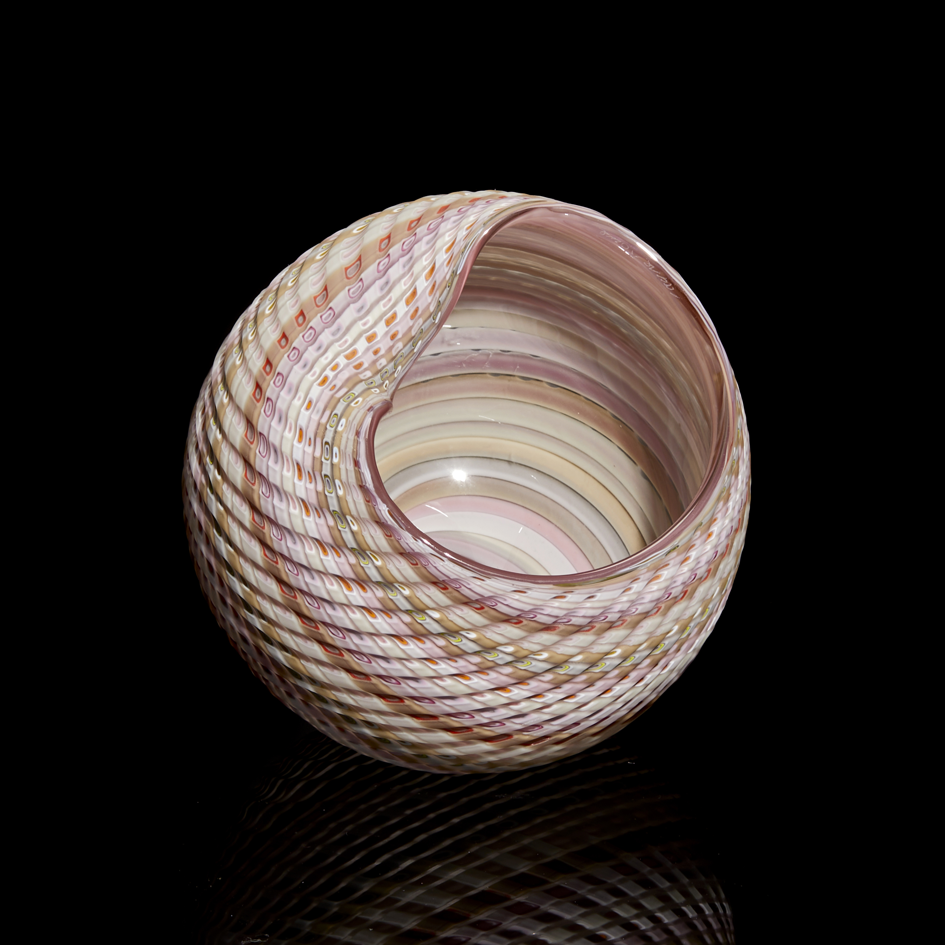 rounded striped shell like sculptural vessel in mixed pastel colours hand made from glass