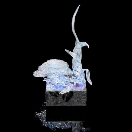 low square base with still life composition on top including a crab coral reef stack and tall marine plant life hand made from clear glass