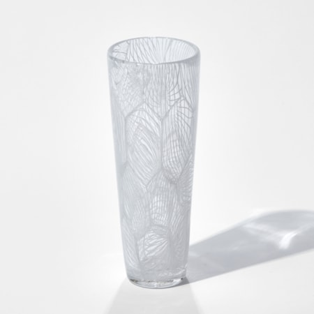 tall clear glass sculpture with external white pattern