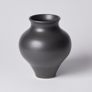small black porcelain decorative sculpture vase with wide midriff