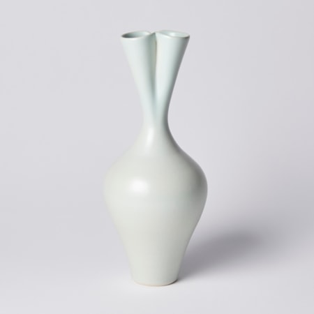 tall green ceramic sculpture of seed pod with twin necked top