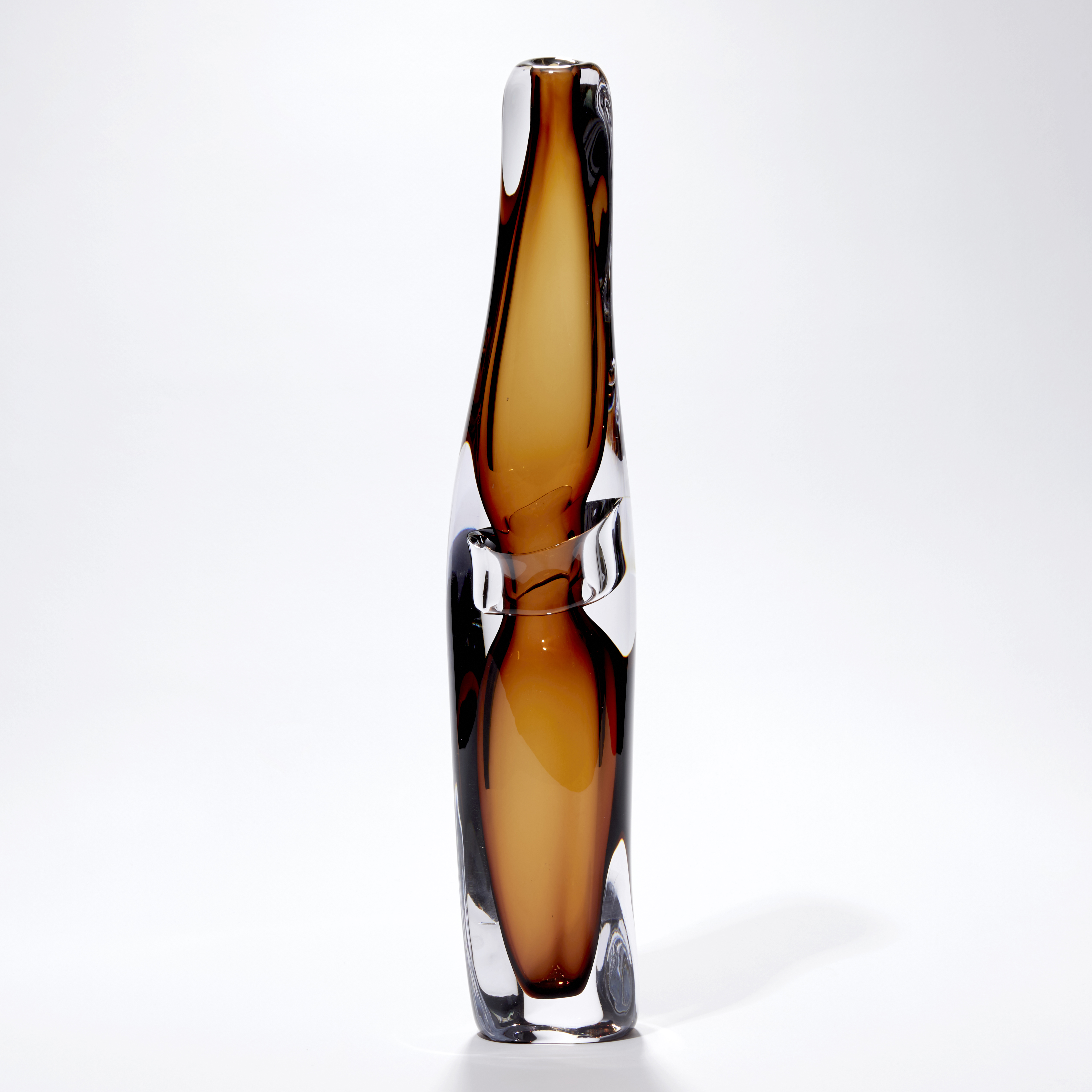 tall transparent warm brown vase with organic lines and central clear band handblown from glass